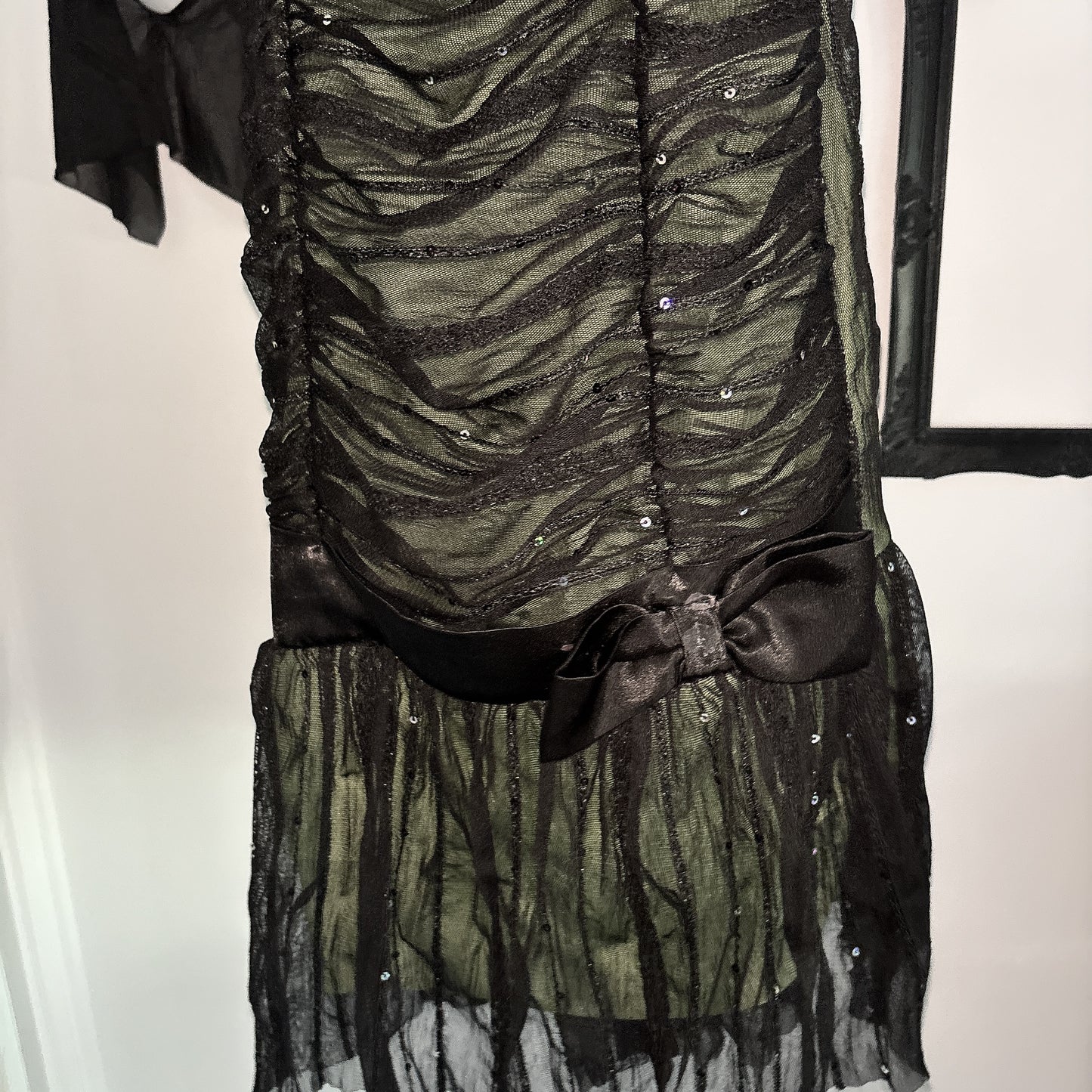 Green and black sequin dress