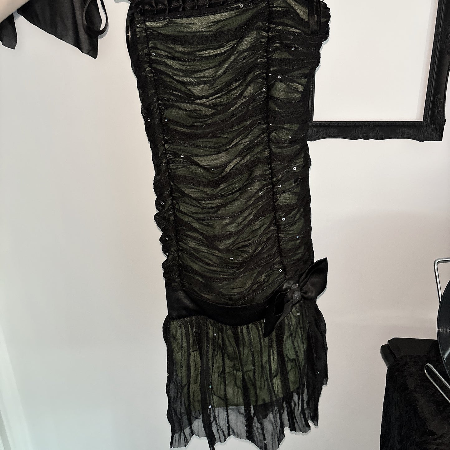 Green and black sequin dress