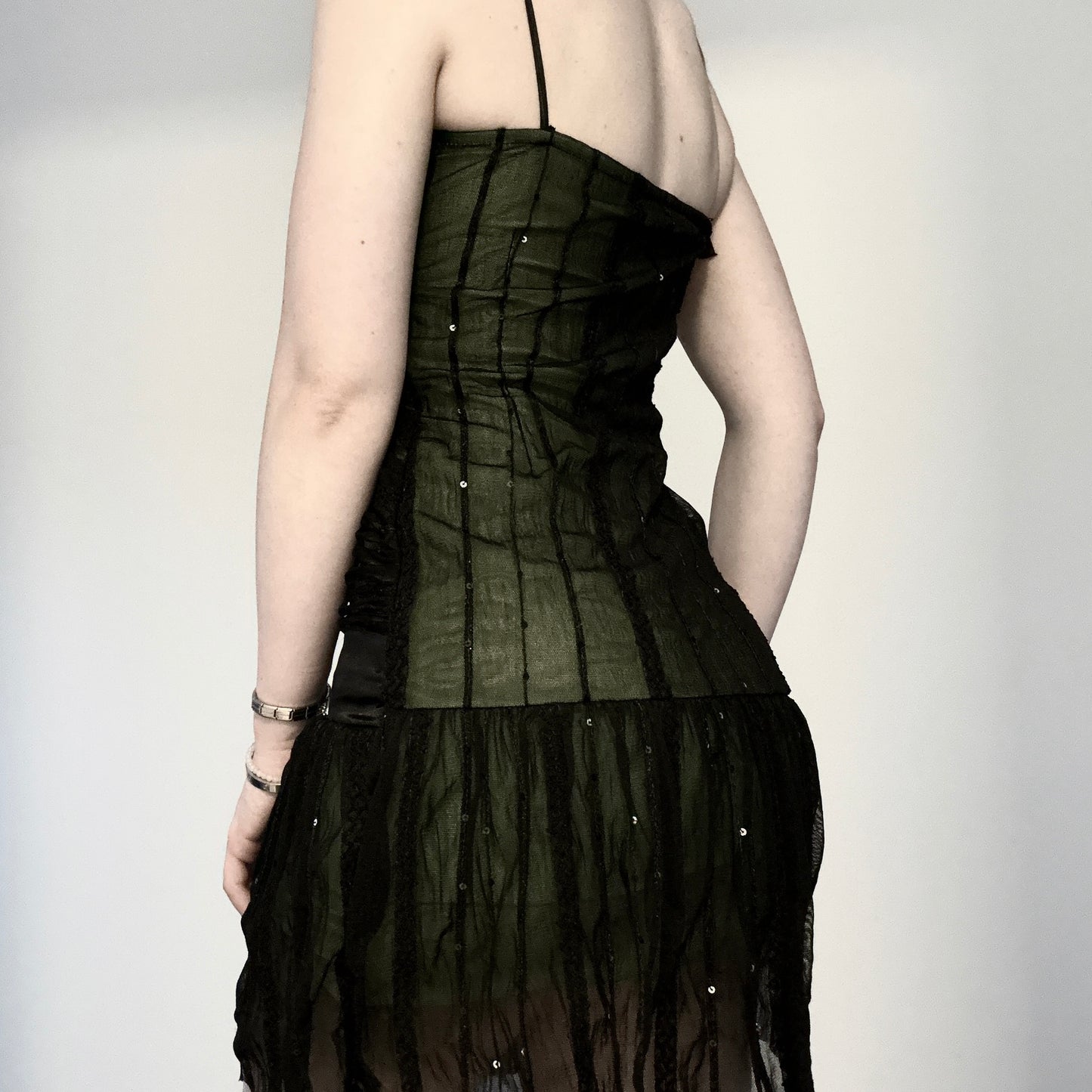 Green and black sequin dress